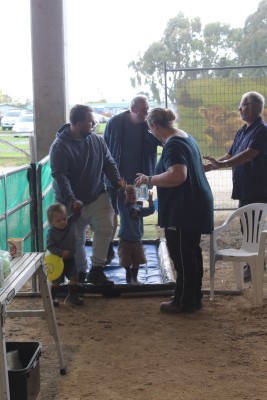 People entering A&amp;amp;amp;amp;amp;amp;amp;amp;amp;amp;amp;amp;P showgrounds, getting their footwear cleaned