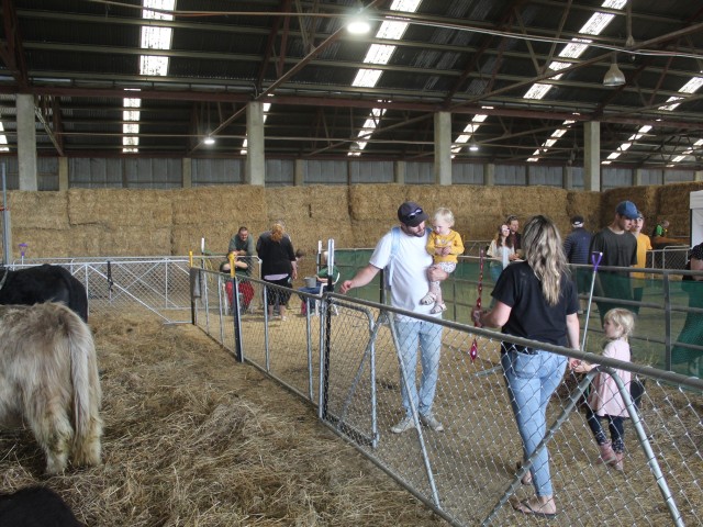 People walking in barricaded queues at and Agricultural and Pastoral Show