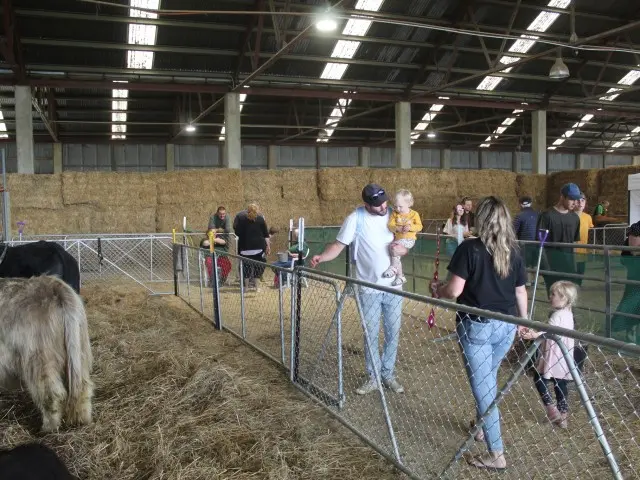 People walking in barricaded queues at and Agricultural and Pastoral Show